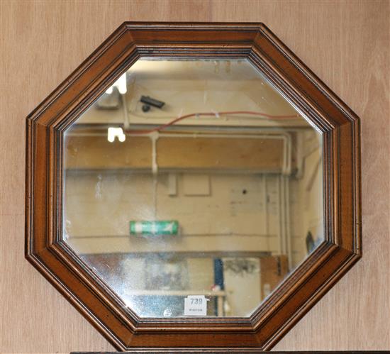 An octagonal wall mirror, W.63cm